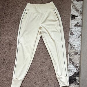 Athleta Cream Joggers with Black Stripes